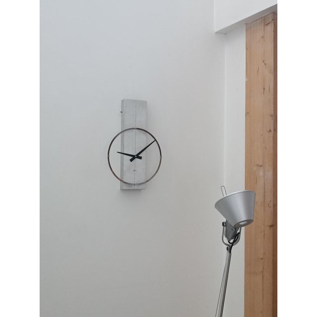 Exquisite Micro Electric wall clock by Microtecnica SA Madrid, Spain, 1970s Brushed aluminum frame. The ring indicating...