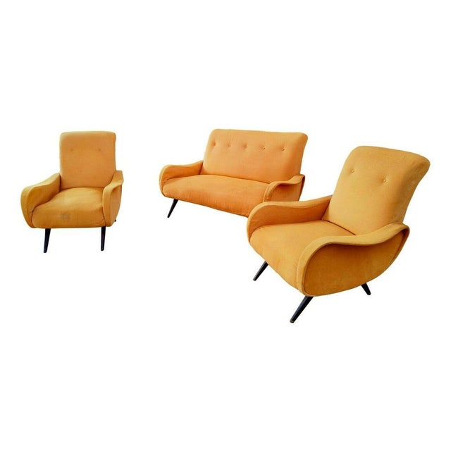 Complete original living room set from the 1960s, consisting of a two-seater sofa and a pair of "lady" armchairs in a...