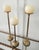 Beautiful set of three vintage brass candlesticks featuring an elegant scalloped design and a clean, polished finish....