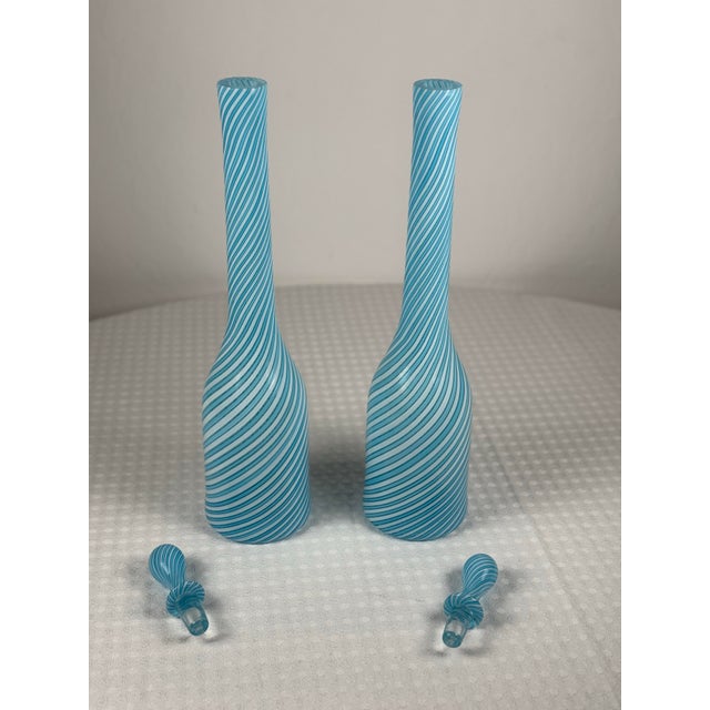 Pair of vintage Fratelli Toso Murano art glass vases, featuring the blue and white diagonal striped design characteristic...