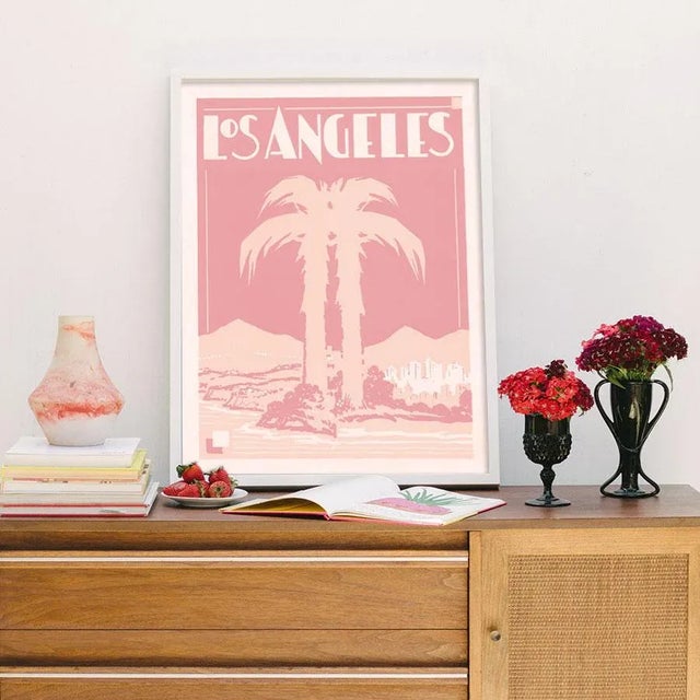 This stylish Deco print is designed from original source materials from a 1920s era travel brochure. Unframed print on...
