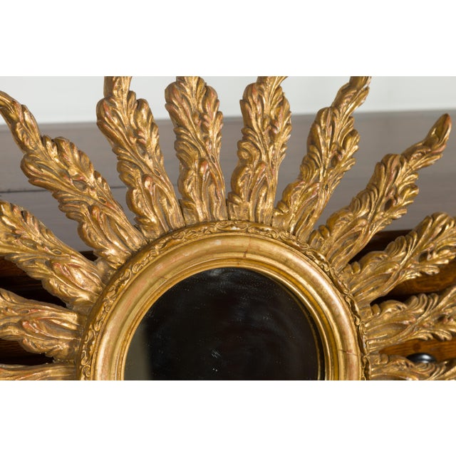 French Giltwood Sunburst Mirror with Wavy Sunrays from the Mid-20th Century For Sale - Image 10 of 11