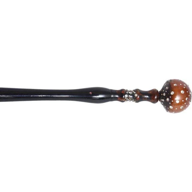 Magnifier with round Bakelite ball accent encrusted with rhinestones, connected to a long ebony handle. The chrome...