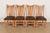 An exceptional set of four Mission or Arts & Crafts style high back dining chairs In the manner of Stickley or Charles...