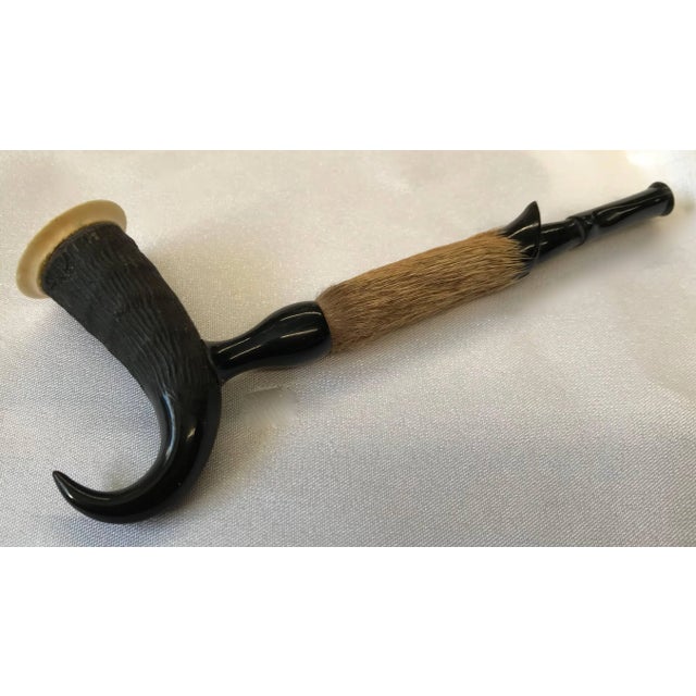 This is a unique addition for your collection! A pipe has been created from an ebonized antler, deer hide and completed...