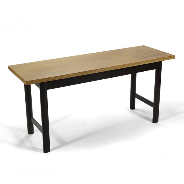 This elegant Probber console table features a top of bleached rosewood supported by a mahogany base with two drawers.