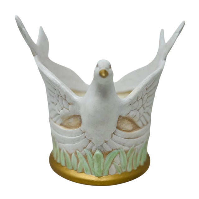 Bring a touch of vintage charm to your home with this beautiful, hand-crafted ceramic dove planter from the 1990s. This...