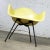 Awesome example of the Charles and Ray Eames LAX molded fiberglass arm shell chair for Herman Miller in one of the...