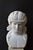 An exquisite hand-carved solid marble bust of Dionysus, the Greek god of wine, pleasure, and festivity. This 20th-century...