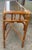 Here is a simple and decorative bamboo long narrow table with a woven rattan top covered by a removeable piece of glass....