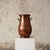 Add striking Old World character to your space with this late 18th century French copper pot, a tall and beautifully hand-...