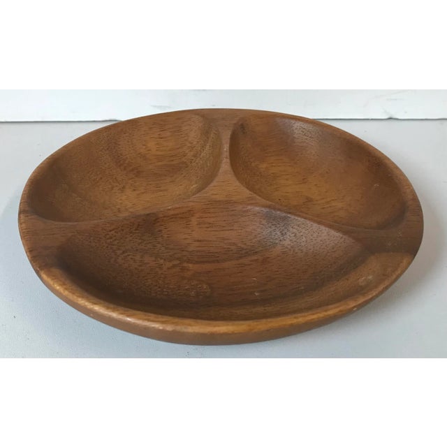 Cute little divided nut bowl made from nice patinated wood.
