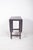 Oval-top table. In dark wood, with an oval top divided into three sections, a fixed centre section and two movable side...
