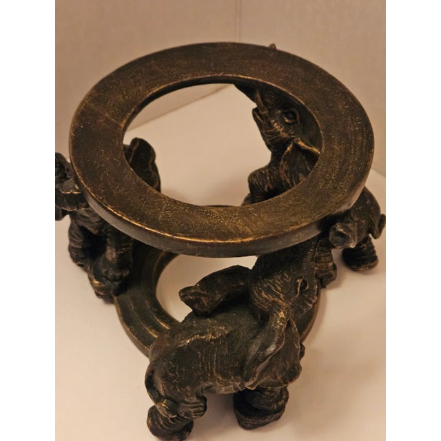 This unique artwork began as an empty ostrich egg to which was applied shards of another egg shell in a deorative...