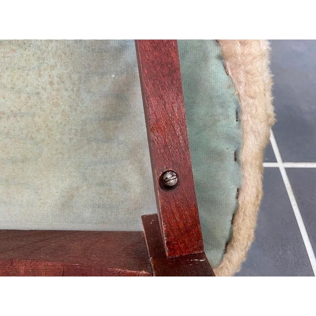 2 identical chairs available for sale Very nice barrel chair covered with a beige moumoute, Wooden compass legs 1960's...