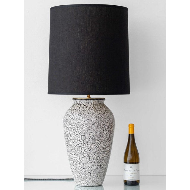 1950s Jasba “Cortina” crackle-glaze mid-century West German ceramic table lamp; large scale with black linen gold-lined...