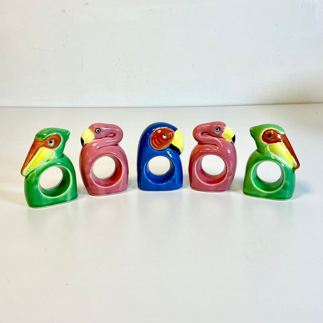 Seagulls, Flamingos and a Parrot, oh my! These are adorable and whimsical. The Napkin Rings are from the 1980s and feature...