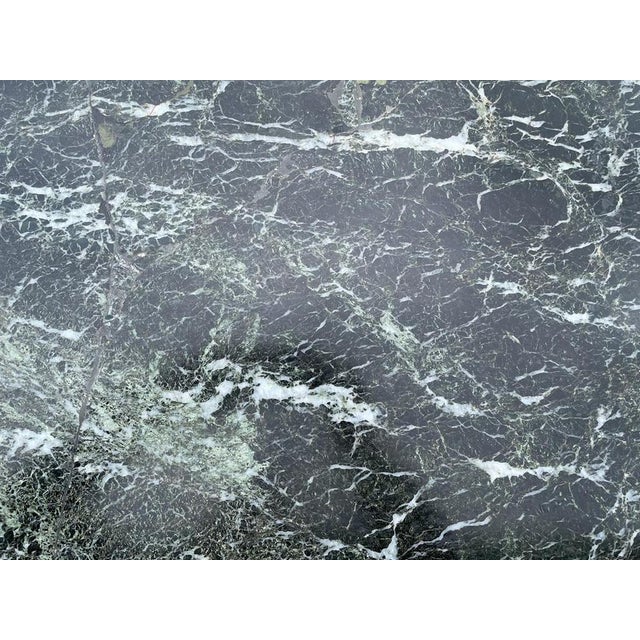 A magnificent 19th-century French Empire commode, crafted with exceptional attention to detail and refined neoclassical...