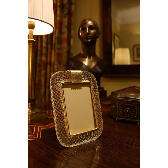 This elegant picture frame, in the style of Barovier & Toso, is a beautiful example of 1990s Murano glass and Art Deco-...
