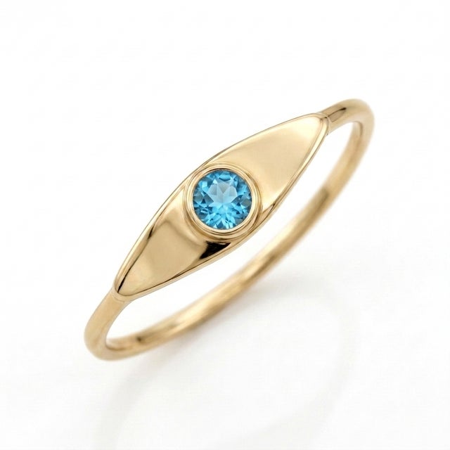 Capture the radiance of clear skies with this eye-catching signet ring. A luminous 3mm Swiss Blue Topaz gemstone is framed...