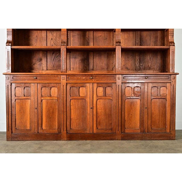 This magnificent vintage bookcase is a demonstration of French craftsmanship intersecting with 20th century design tastes...
