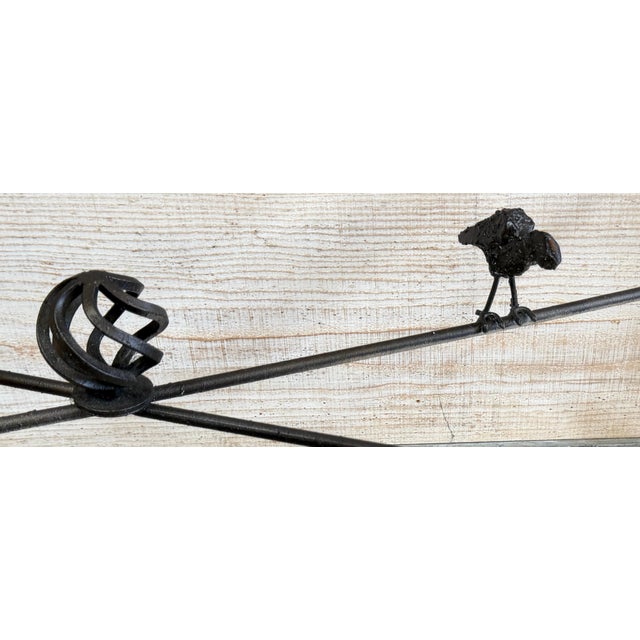 Ilana Goor Forged Iron and Beveled Glass Console Table, Israel/USA, Circa 1980s A sculptural forged iron and beveled glass...