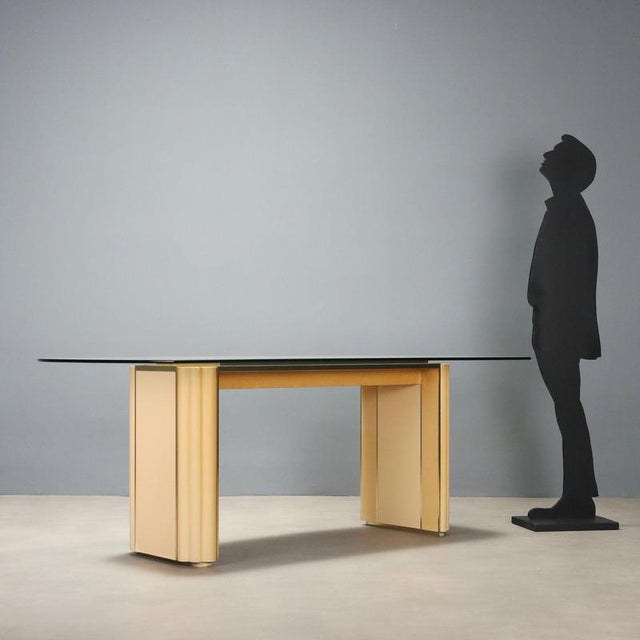 AD 006' table model designed by Alain Delon for Mario Sabot in the 1970s. The glass top offers an elegant transparency...