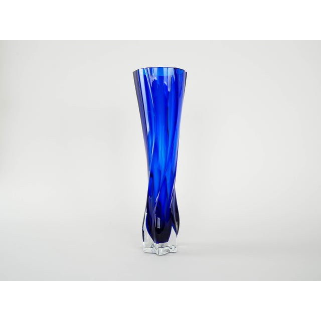 A spectacular cobalt crystal vase from the 1970s – luxurious design and sculptural form. An impressive, hand-cut vase made...
