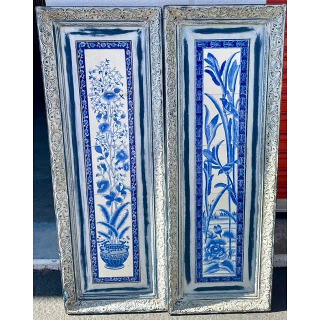 Bring timeless blue-and-white elegance to an interior with this striking pair of framed chinoiserie-style ceramic tile...