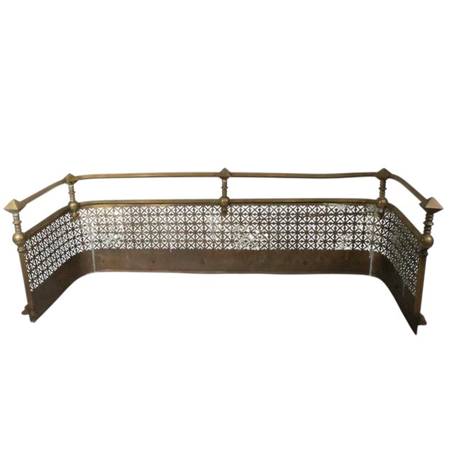 Antique victorian, aesthetic movement style brass fireplace fender, having a reticulated. front , animal paw feet , an...