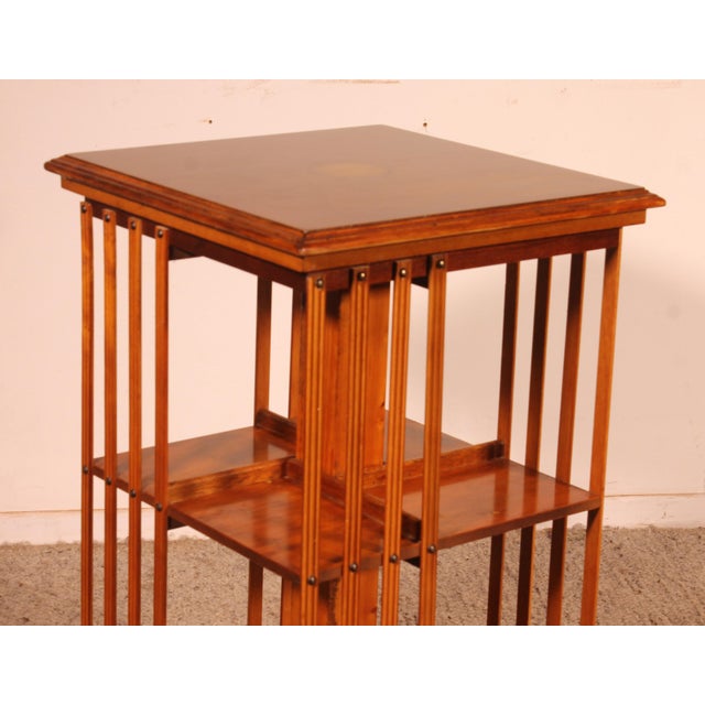 Revolving bookcase in yew wood and medallion