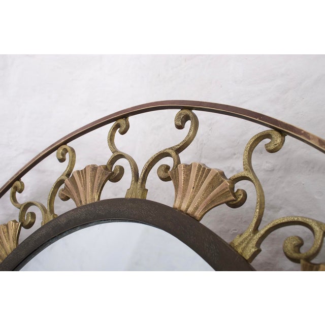 Maison moderna, an art deco mirror, 1930s. Dimensions: h 98 cm x w 69 cm x d 4 cm. H mirror only 74 cm x w mirror only 44 cm.