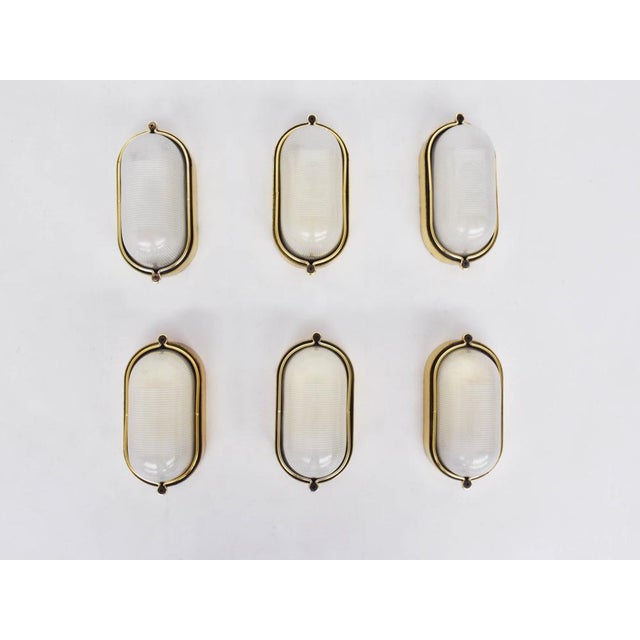 Nautical Wall Sconce in Brass and Glass, 1970, in Very Good conditions. Designed 1970 to 1979 European Plug (up to...