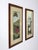 A pair of vintage Warren Kimble prints featuring classic Americana scenes: Brandon Barn, with a vivid red barn on a green...