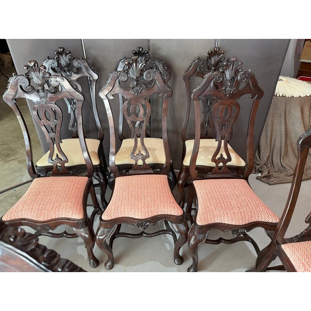 A set of six Portuguese dining chairs, comprised of five side chairs and one armchair. Mid-18th century together with four...