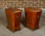 A pair of English Victorian period red lacquered tôle cellarettes from the 19th century with gilded Chinoiserie décor and...