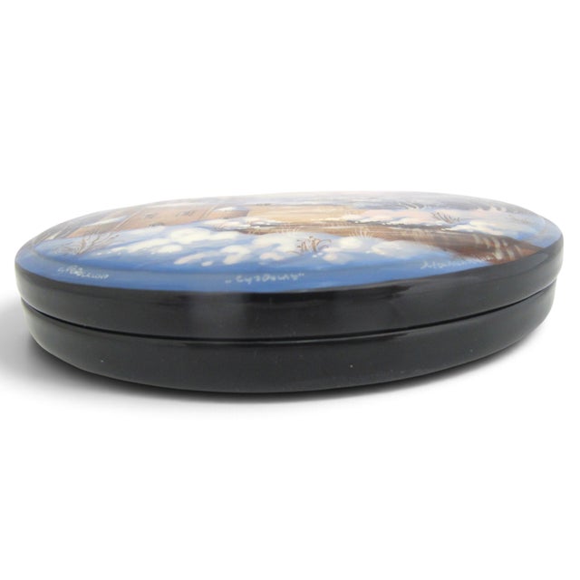 Russian Fedoskino hand painted lacquer box featuring a stunning miniature painting of a winter landscape in Suzdal with...