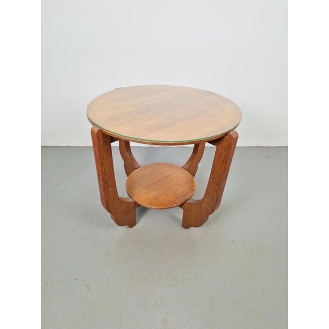 This beautiful vintage Art Deco side table from the 1930s features beautiful lines with many round shapes. The side table...