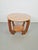 This beautiful vintage Art Deco side table from the 1930s features beautiful lines with many round shapes. The side table...