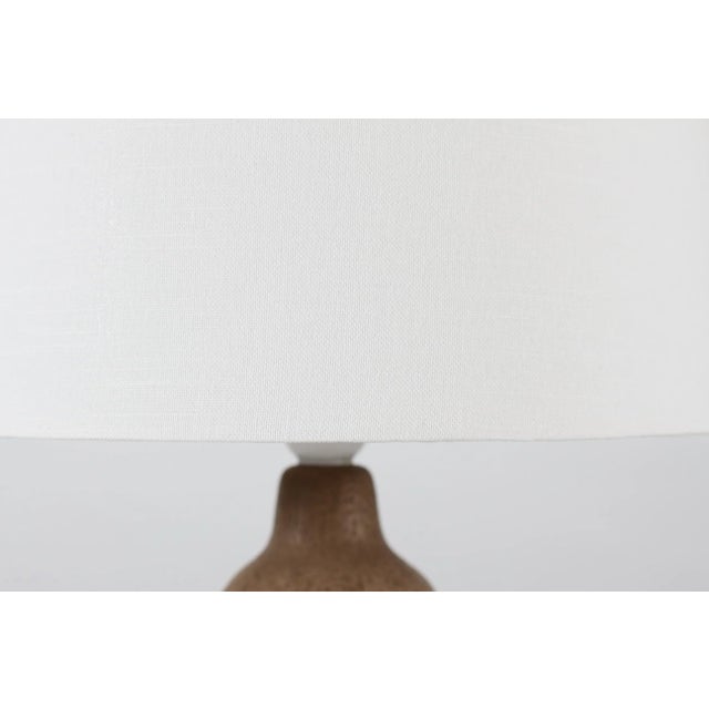 Ceramic table lamp by Einar Johansen made at his own ceramic studio in Denmark circa 1960´s The unglazed light brown lamp...