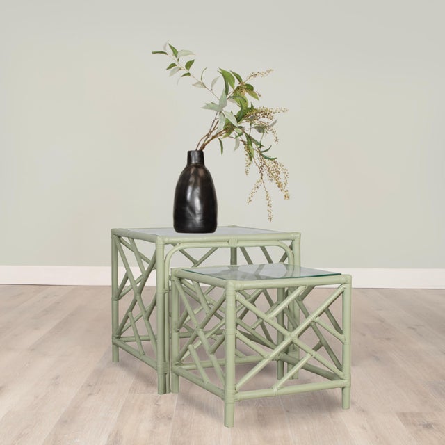 This exquisite set of rattan nesting tables blends classic chinoiserie charm with modern sophistication. Crafted with a...