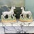 the Staffordshire tradition, each modeled in a mirrored stance for balanced display. Stamped “Old Staffordshire England”...