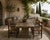 This vintage set of four fireside chairs is built from solid pine in a dark-toned stain, with a ladder-back frame, hand-...