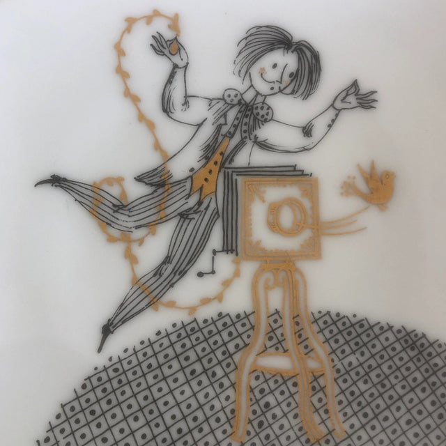 This sweet little porcelain dish features a whimsical old time photographer taking a picture and a dove coming out of the...