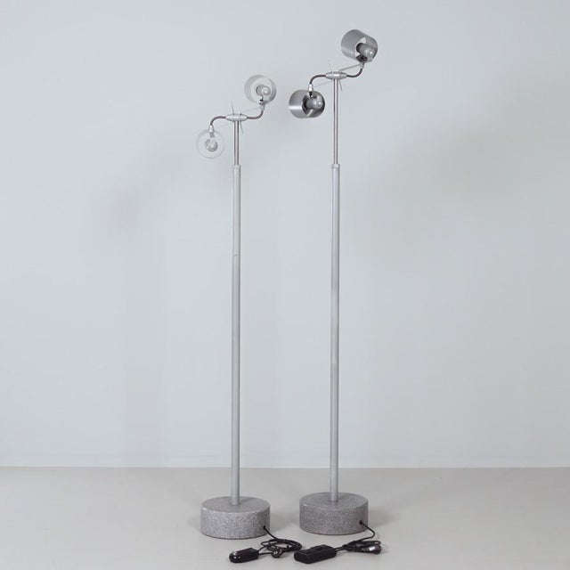 Stadium 1 pallucco floor lamps by hannes wettstein; a set of telescopic floor lamps with an industrial character. The...