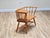 A quiet companion from a more gracious age, this Ercol telephone seat, designed by Lucian Ercolani and made in England in...