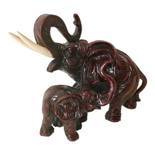 Burgundy Carved Elephants Statue For Sale