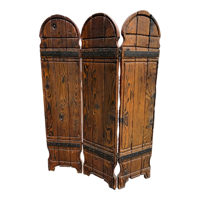This is a chunky hand-carved wooden floor screen or room divider, produced by Pacific Northwest furniture creator Witco....