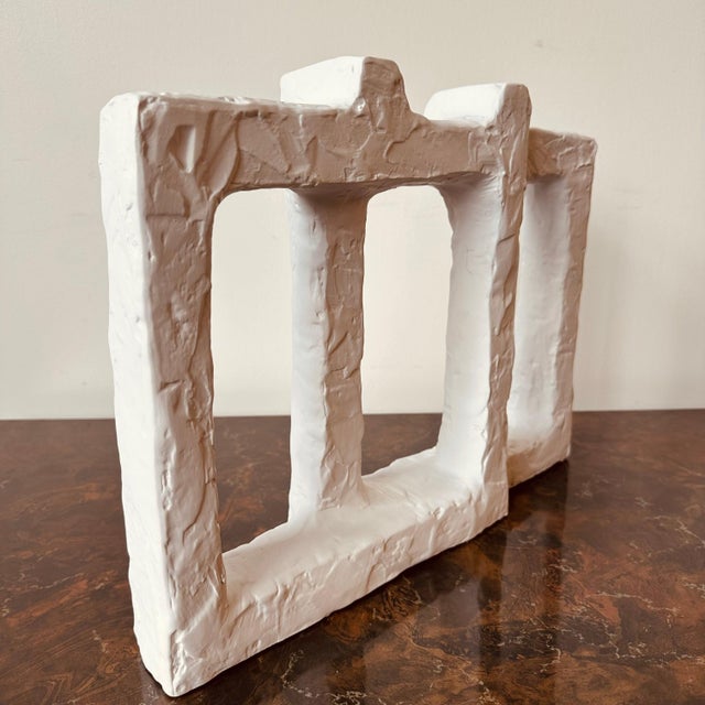 Wide textural vase with two mouths, made of hand formed Italian ceramic with a matte white finish. See coordinating vase...