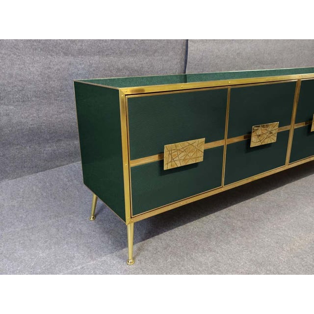 This exquisite dark green Italian buffet sideboard is a masterpiece of craftsmanship, blending Mid-Century Modern style...